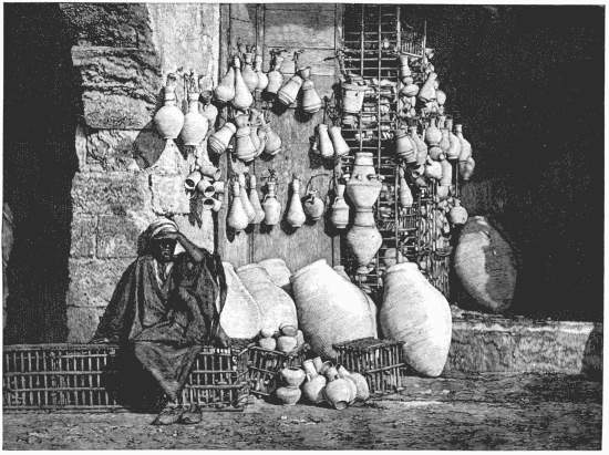 A SELLER OF WATER-JUGS, CAIRO. From a photograph by
Sebah, Cairo